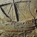 Phoenician ship carved on the face of a sarcophagus.